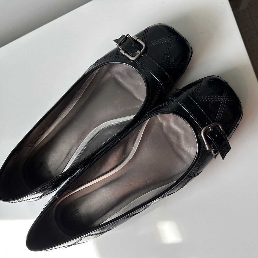 Black patent leather wedge shoe. Size 11.